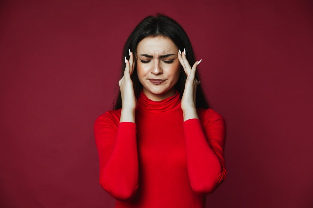 Girl in Headache wearing red dress