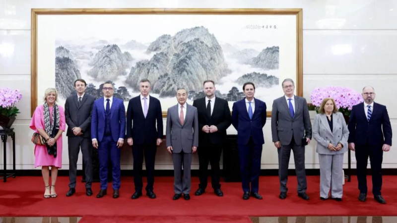 Chinese Foreign Minister Wang Yi (fifth from left) meets with a cross-party delegation of the European Parliament in Beijing, the capital of China, July 21, 2026. /CGTN
