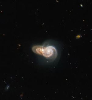 Hubble Telescope captured two spiral galaxies overlapping