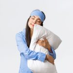 sleep well, a girl with pillow pretending to be asleep