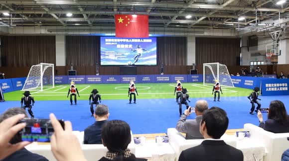 রোবটের ফুটবল লড়াই: বেইজিংয়ে শুরু হলো মাধ্যমিক শিক্ষার্থীদের প্রথম হিউম্যানয়েড রোবট টুর্নামেন্ট