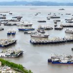 Fishing boats return to shelter from Typhoon Saudel at a fishing port in Shitang Township of Wenling, east China’s Zhejiang Province, August 25, 2026. /VCG